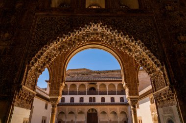 Illuminated Moorish Splendor: Muqarnas Arch in the Alhambras Court of Myrtles