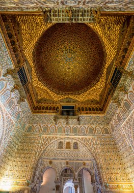 Glittering Dome and Mudejar Arches in the Saln de los Embajadores, Royal Alczar of Sevilles Exquisite Moorish-Inspired Andalusian Grandeur clipart