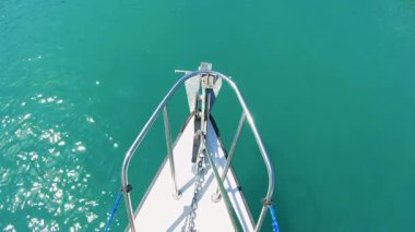 Tranquil boat ride Lake Serre-Poncon turquoise water mountain backdrop