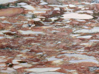 Ev dekorasyonu için zengin renkleri ve dokusu olan bir taş patırtısının arkaplanı.