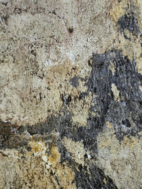 Ev dekorasyonu için zengin renkleri ve dokusu olan bir taş patırtısının arkaplanı.