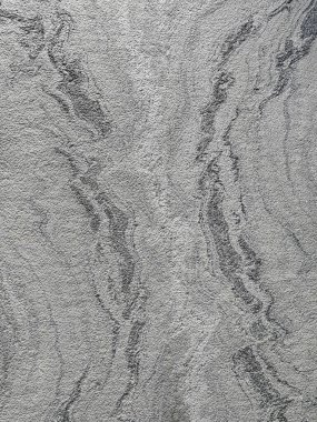 Ev dekorasyonu için zengin renkleri ve dokusu olan bir taş patırtısının arkaplanı.