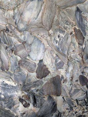 Ev dekorasyonu için zengin renkleri ve dokusu olan bir taş patırtısının arkaplanı.