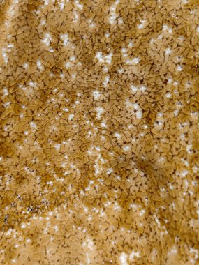 Bal renkli sıva duvar dokulu arka plan kırık