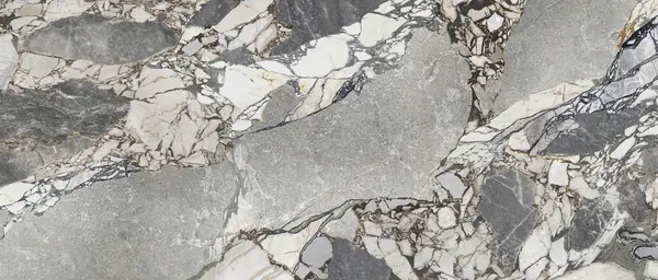 Arka plan için doğal desenli mermer dokular. Dekoratif dizayn tabanı veya duvar için doğal taş ya da mermer dokusu ve arka plan lüksüne sahip.