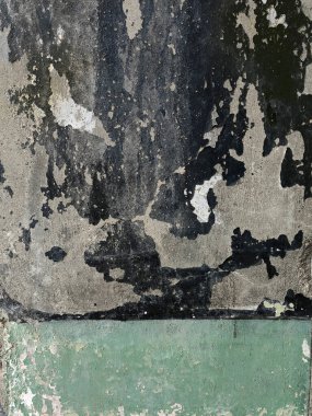 Duvarda grunge ve çizikle boyanmış renkli yeşilden soyut bir arkaplan. Sanat retro ve vintage arkaplan.