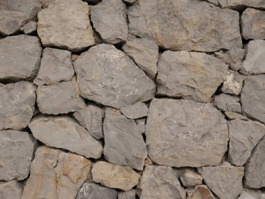 Taş bir duvarın dokusu. Eski kale taşı duvar dokusu arkaplanı