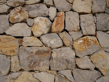 Taş bir duvarın dokusu. Eski kale taşı duvar dokusu arkaplanı