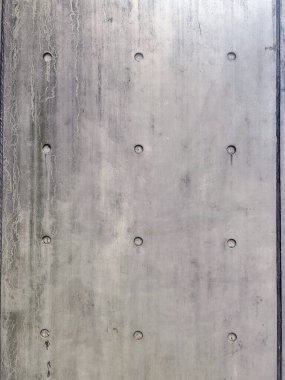 Çıplak beton yüzeyin arka planı güçlü görünüyor. Gri sıva duvar arka planı. Beyaz, beton duvar dokusu
