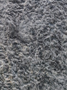 Gri taştan bir arka planın dokusu. Bir taş desenli ayrıntılı ev dekorasyonunu kapat