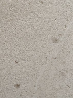 Gri taştan bir arka planın dokusu. Bir taş desenli ayrıntılı ev dekorasyonunu kapat