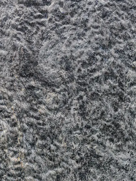 Gri taştan bir arka planın dokusu. Bir taş desenli ayrıntılı ev dekorasyonunu kapat