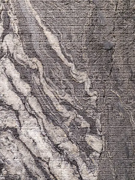 Gri taştan bir arka planın dokusu. Bir taş desenli ayrıntılı ev dekorasyonunu kapat