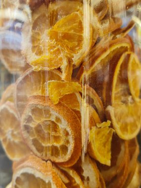 Susuz Portakal Dilimleri Macro. Portakal dilimlerinin fotoğrafı. Bölümler görülüyor. Portakal ya da diğer meyveler onları korumak için kurutulmuş olabilir. Portakallar kuru..