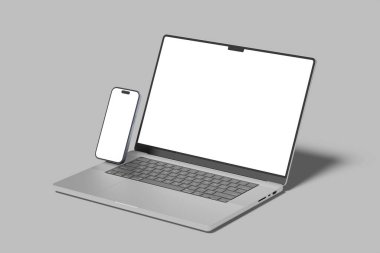 Masada boş ekran olan dizüstü bilgisayar ve akıllı telefon modeli, konsept modeli