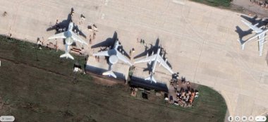 PC user zooms in using satellite images showing large heavy Russian military aircraft seen at airfields near Taganrog, Rostov Oblast, Russia.  clipart