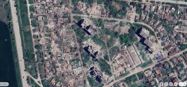 PC screen using satellite imagery zooms into the city of Mariupol, Ukraine showing complete destruction. 10/10/2024 clipart