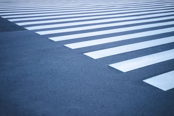 crosswalk, road area for pedestrian crossing by bringing black and white stripes like the color of a zebra.