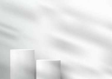 Temiz zeminde yumuşak yeşillik gölgeli iki beyaz silindirik podyumun, ürün modellemelerinin, vitrinlerin ve tasarım sergilerinin yer aldığı minimum 3 boyutlu bir sahnenin zarifliği.
