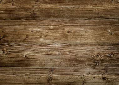 Doğal düğüm ve tahıl desenlerini gösteren aşınmış ahşap kalaslardan oluşan yakın çekim..