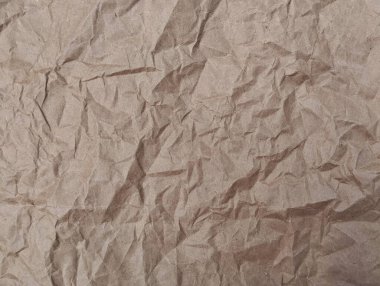 Soyut kahverengi buruşmuş kağıt dokusu ve arkaplan 