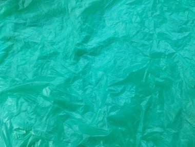 Soyut yeşil buruşmuş plastik torba dokusu ve arkaplan 