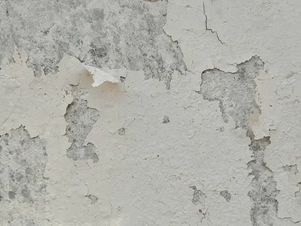 Dökülen boya dokusu arka planıyla yıpranmış eski grunge duvarını kapat