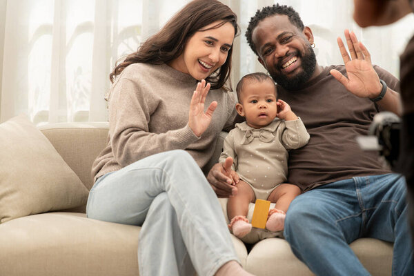 Parents and children relax during their holiday at home