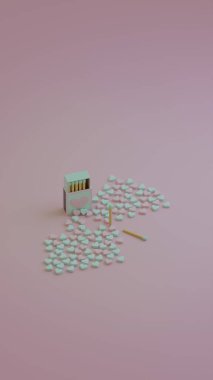 Yeşil uçlu kibrit çöpleri pembe ve nane şekerleriyle karıştırılmış.