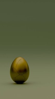 Cracked golden egg on a smooth surface clipart