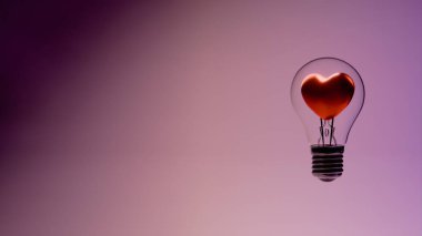 Cam ampulün içinde kalp şeklinde lifli ampul metal tabanlı ve pembe arkaplandaki destek kabloları ampul hatlarını ve taban vidalarını gösteriyor.