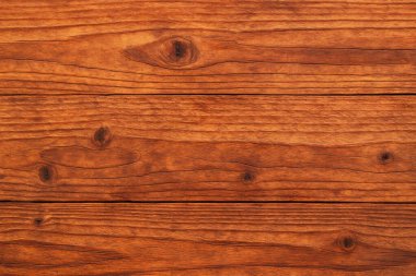 Güzel bir eski ahşap yüzeyi, sıcak, zengin meşe renklerini sergiliyor. Tahıl ve düğümler, otantik ve sıcaklığı hedefleyen tasarım için mükemmel, sade ve rahat bir hissi çağrıştıran görsel bir şablon oluşturuyor..