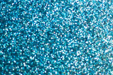 Bokeh efektli soyut bir mavi arkaplan. Sunumlar, web tasarımı, sosyal medya ve reklam materyalleri için mükemmel.