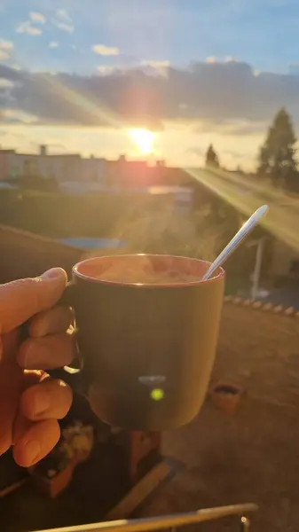 coffee cup on the roof of the city