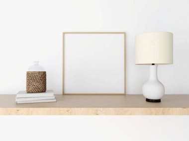 Boş kare çerçeve modeli, kitaplarla dekorasyon, cam şişe ve masa lambası. 3d görüntüleme, iç tasarım, 3d illüstrasyon