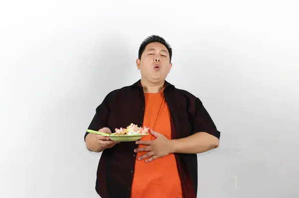 Aşırı Yiyen ve Dolu Hisseden Adam