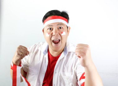 Kazanan Asyalı jest. Endonezya 'nın uygunsuz gününü kutluyor.