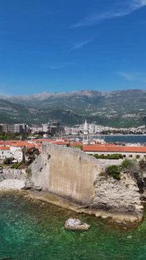 Aerial view of Budva, old and modern city on Adriatic Sea coast. Center of Montenegrin tourism and popular sea resort