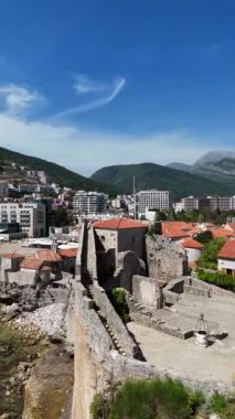 Aerial view of Budva, old and modern city on Adriatic Sea coast. Center of Montenegrin tourism and popular sea resort