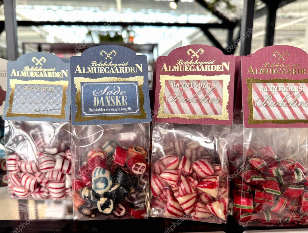 Selection of Almuegaarden candys packaging display. Copenhagen, Denmark - June 5, 2025