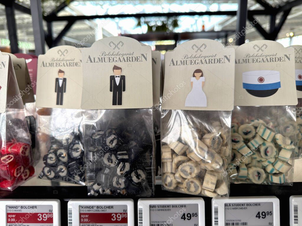 A lrge selection of Almuegaarden candys packaging display. Copenhagen, Denmark - June 5, 2025