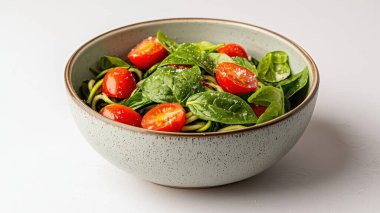 Wholesome Plant-Based Noodle Salad with Spinach and Cherry Tomatoes in a Fresh Bowl clipart