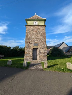 Historic clock tower in Marloes, Pembrokeshire, Wales clipart