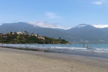 beach with sea and mountains