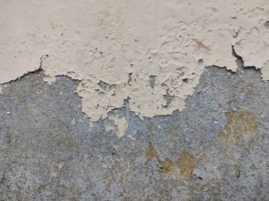 Grunge Duvar Dokusunu Soymak. Yamalanmış ve Yıpranmış Duvarlar. Paslı ve harap olmuş Duvar Yüzeyi. Çatlamış ve desenli Çimento Duvarı. . 