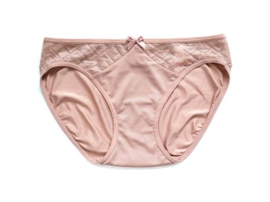 Beyaz arka plan üzerinde izole bej seksi kadın külot iç çamaşırı.