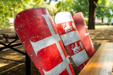 Worn red and white Hungarian medieval historical shields clipart