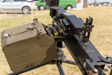 Anti-aircraft machine gun aims at the sky