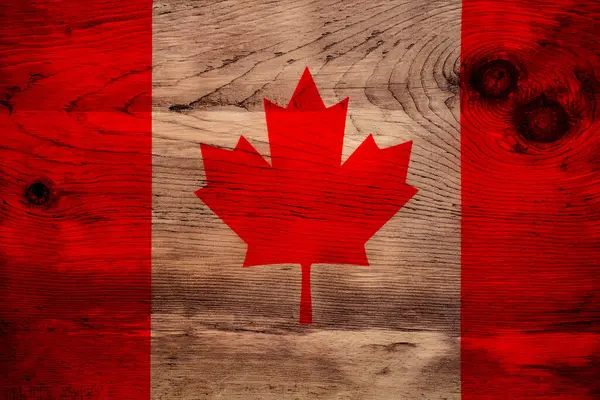 Doğal ahşap arka planda Kanada bayrağı