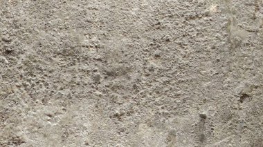 Sertleştirilmiş çimento ile içine kum karıştırılmış arka plan dokusu yüzeyde yükselir..